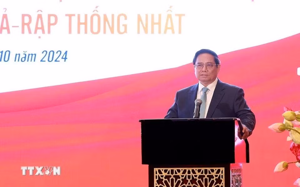 Minh Chinh habla en el evento.