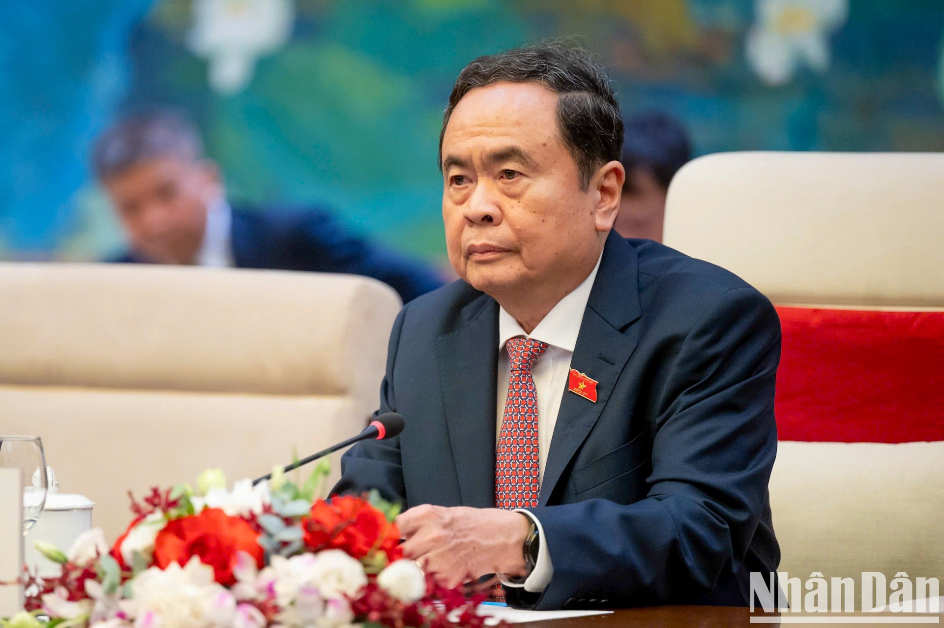 Thanh Man habla en el encuentro.