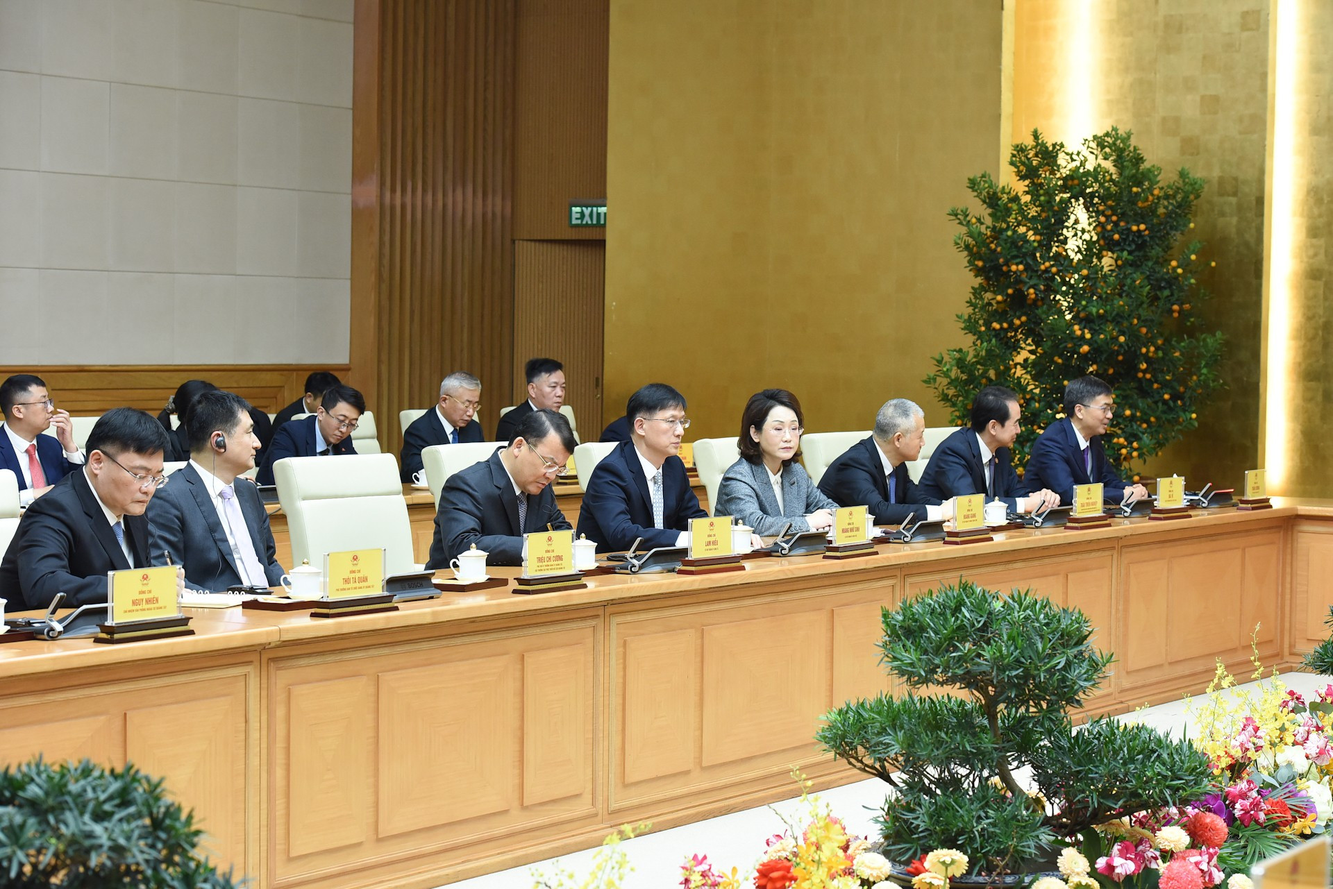 Delegados chinos en la cita.