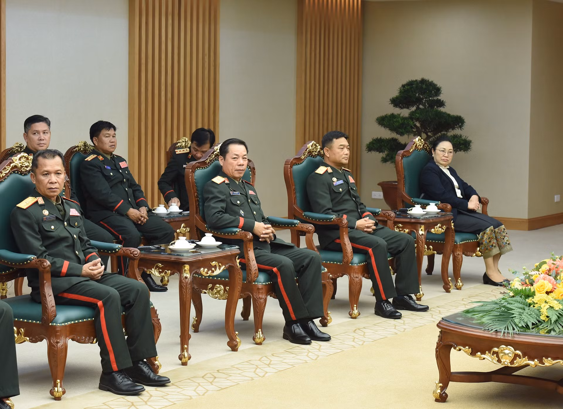 Miembros de la delegación laosiana.