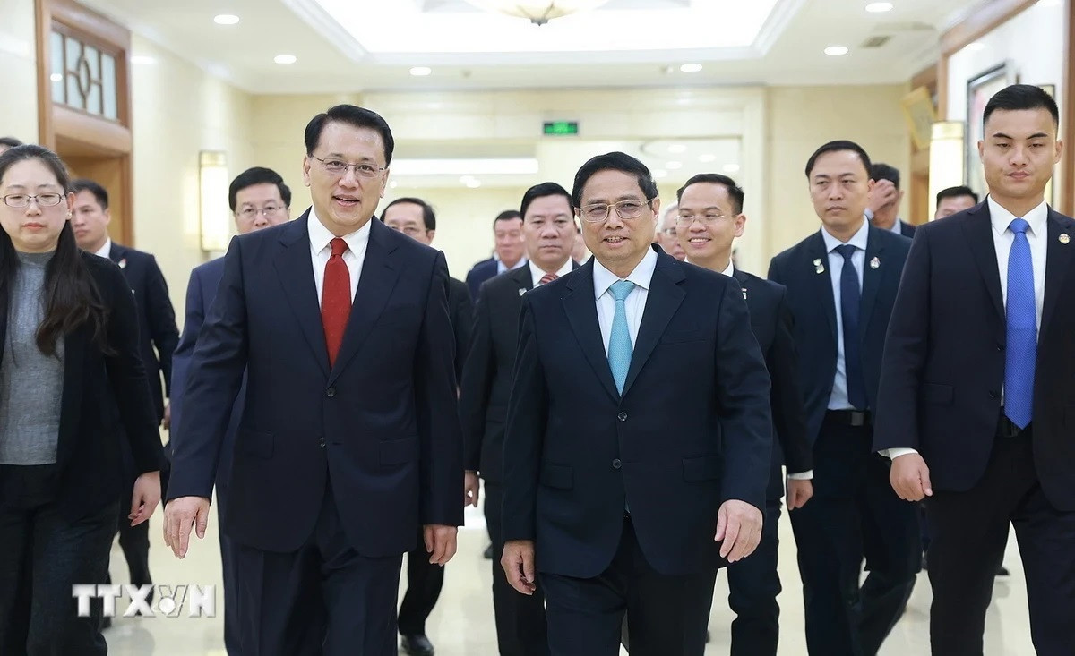 El jefe de Gobierno vietnamita y el dirigente partidista de Chongqing.