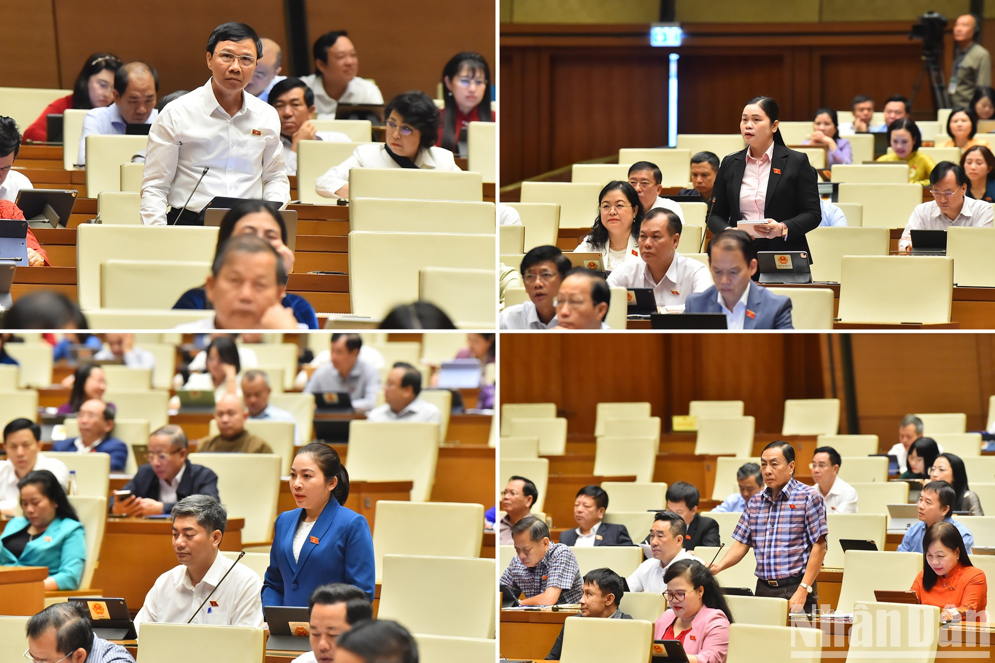 Los diputados de provincias y ciudades formulan preguntas a la gobernadora del Banco Estatal de Vietnam, Nguyen Thi Hong.