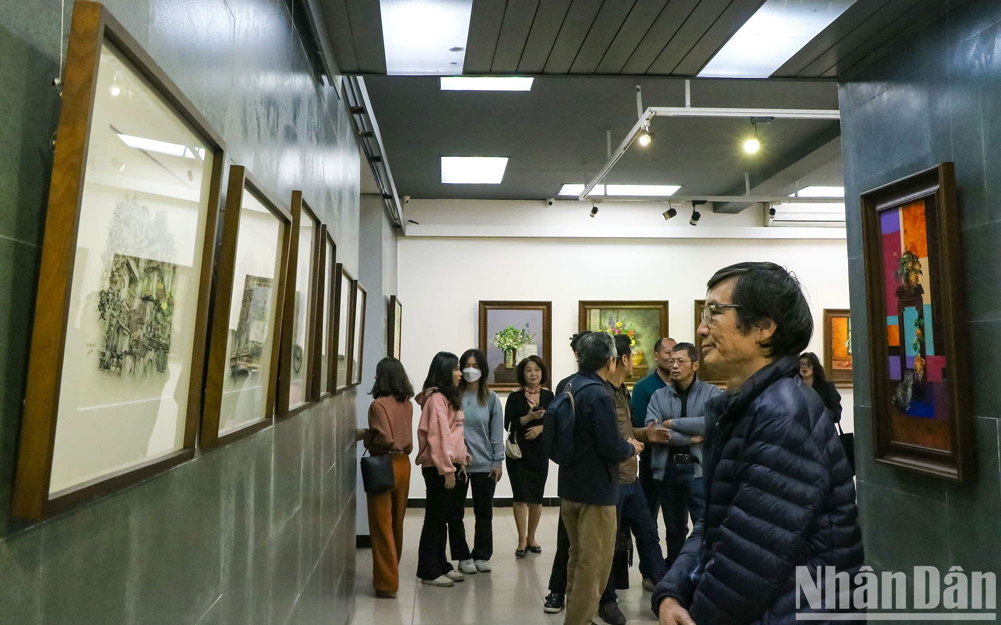 Visitantes a la exposición. Visitantes a la exposición.