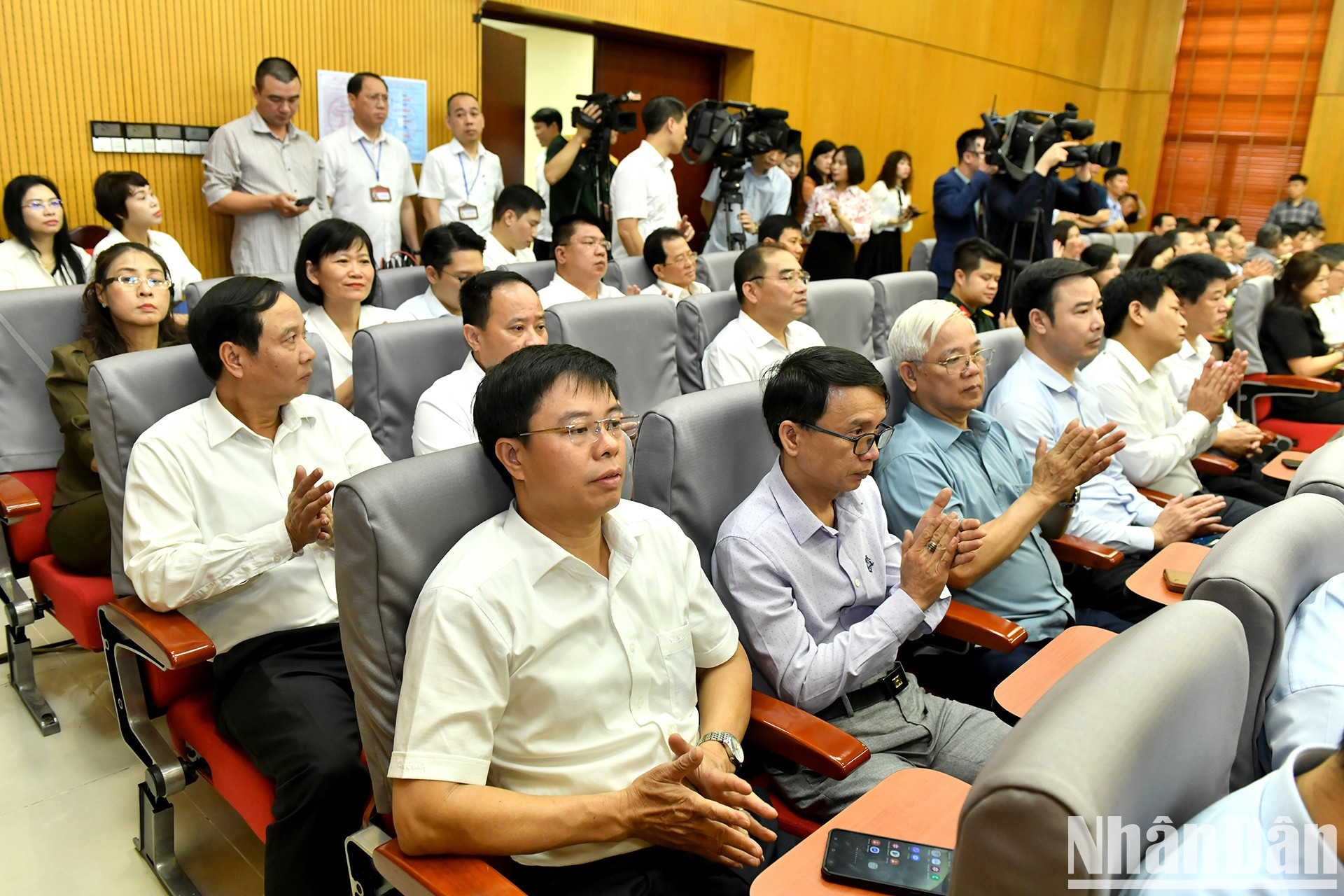 Delegados y votantes asistentes a la conferencia.