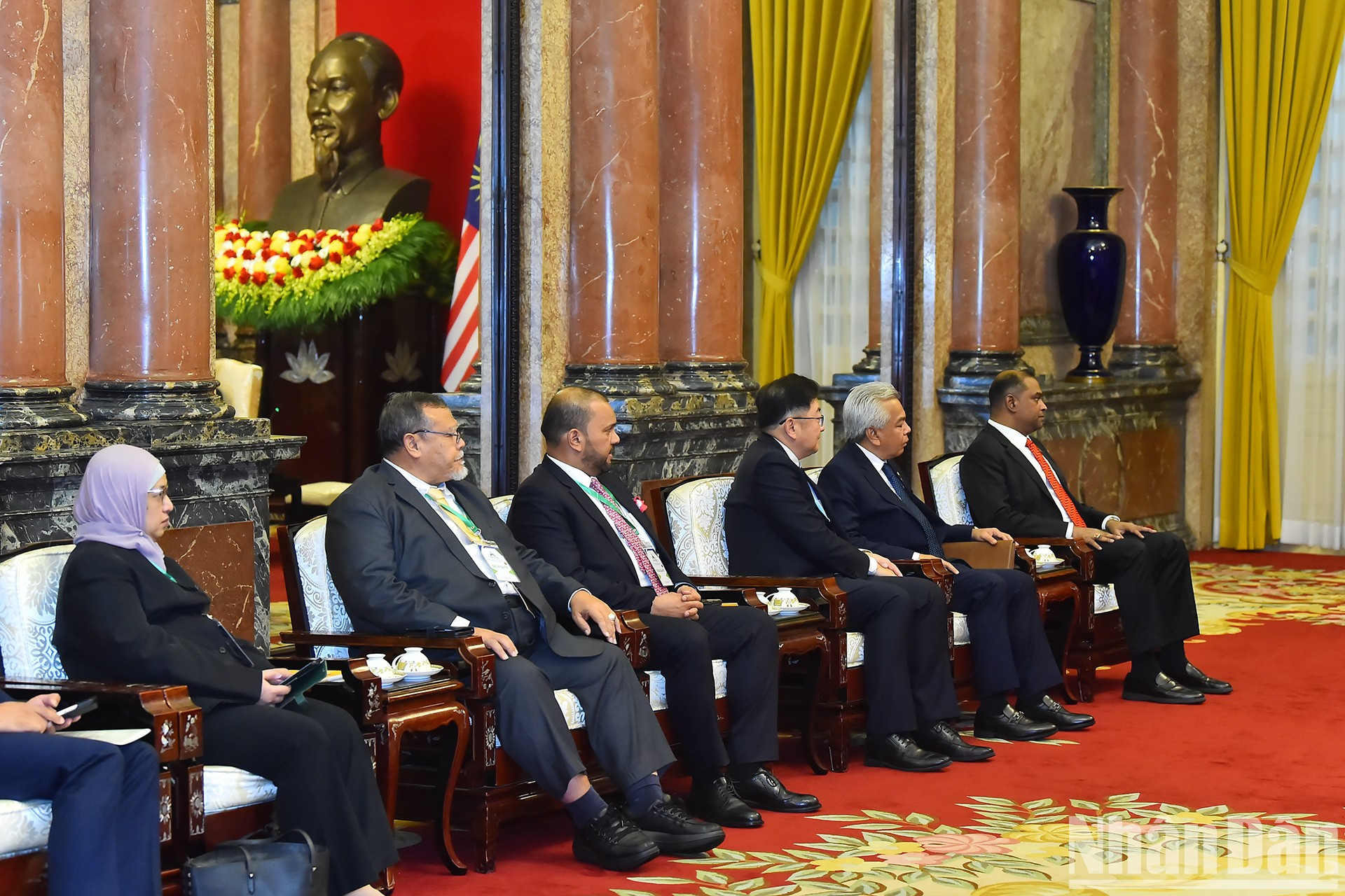 Delegados malasios en el acto.