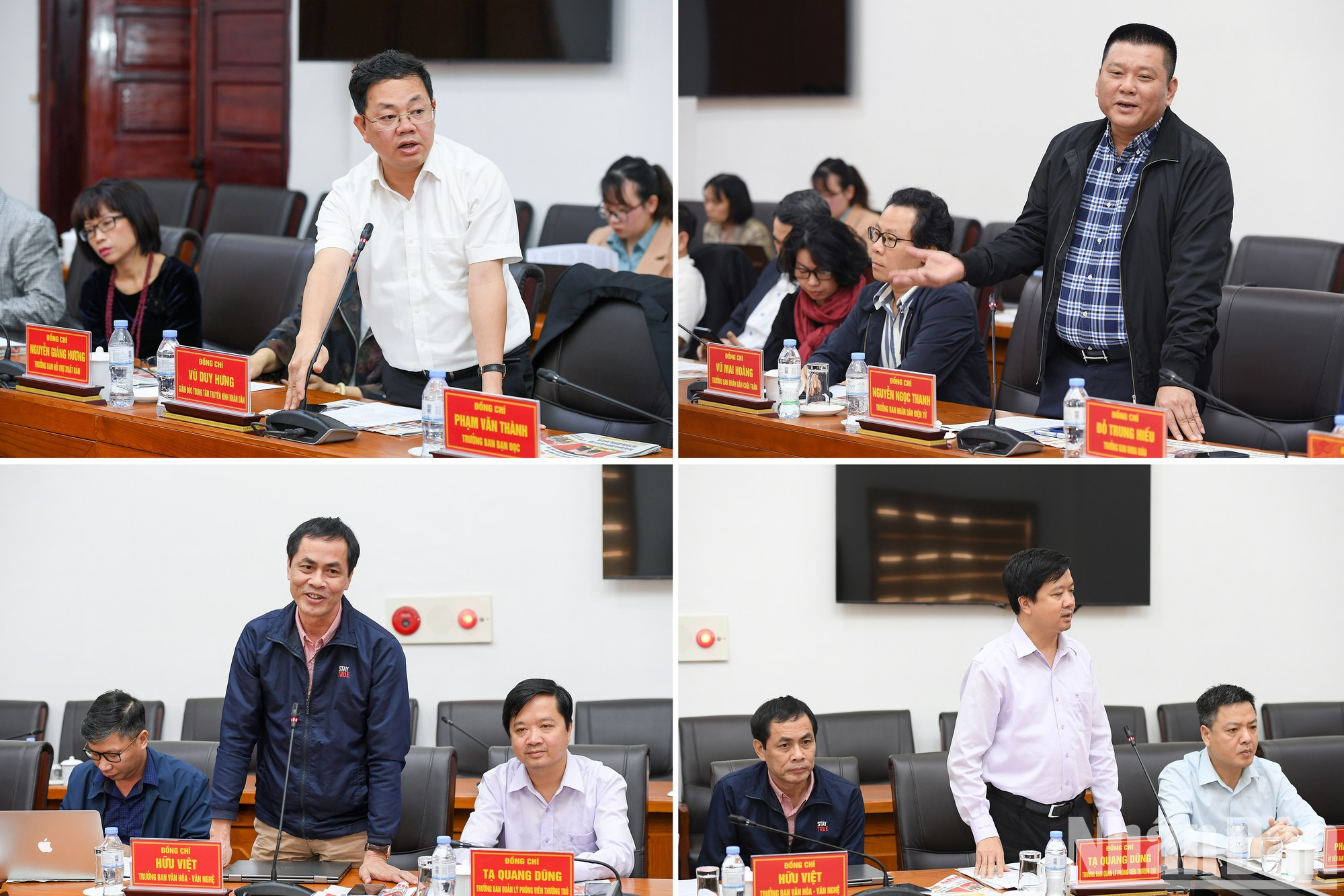 Los delegados del periódico Nhan Dan hablan en la cita.