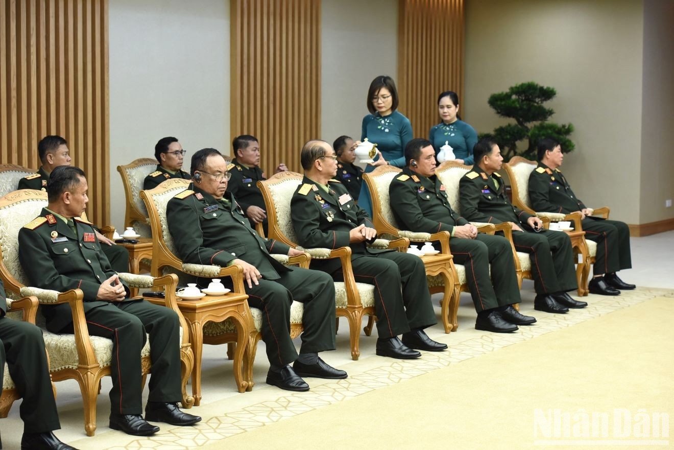 Delegados laosianos en el evento. Delegados laosianos en el evento.