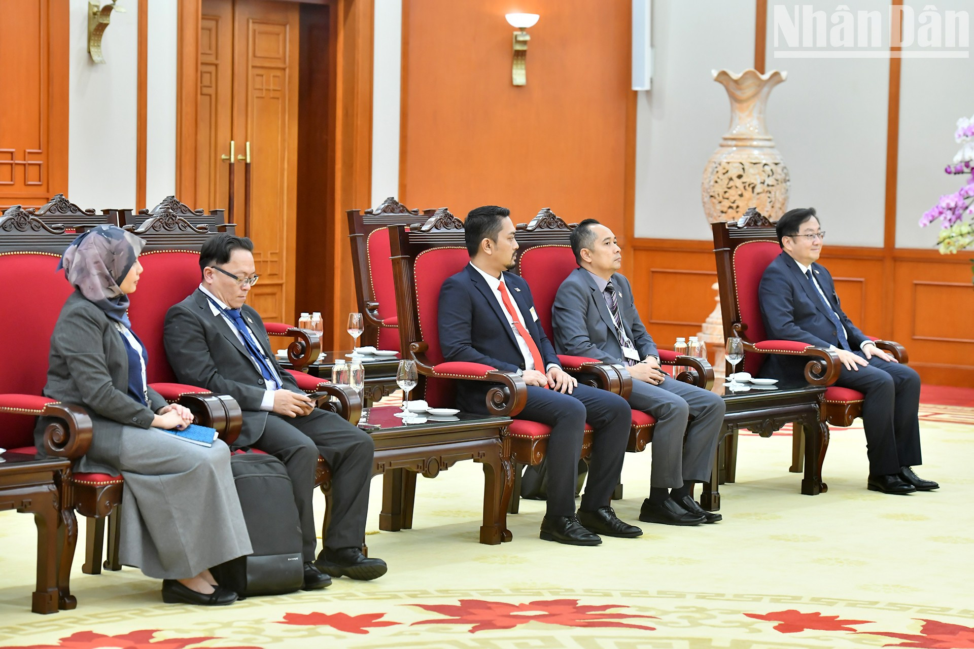 Delegados de Malasia en la reunión.