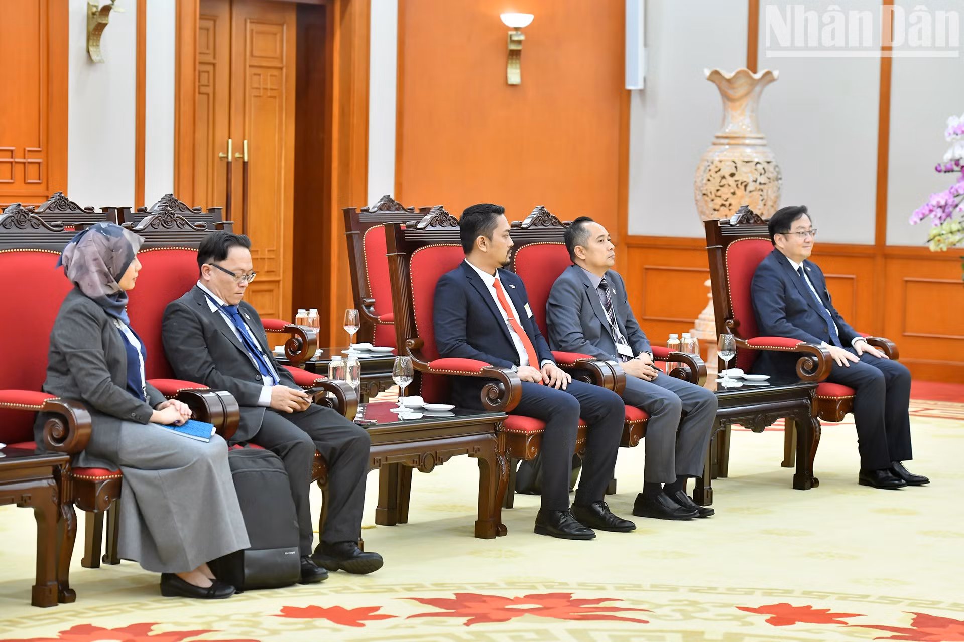 Delegados de Malasia en la reunión.