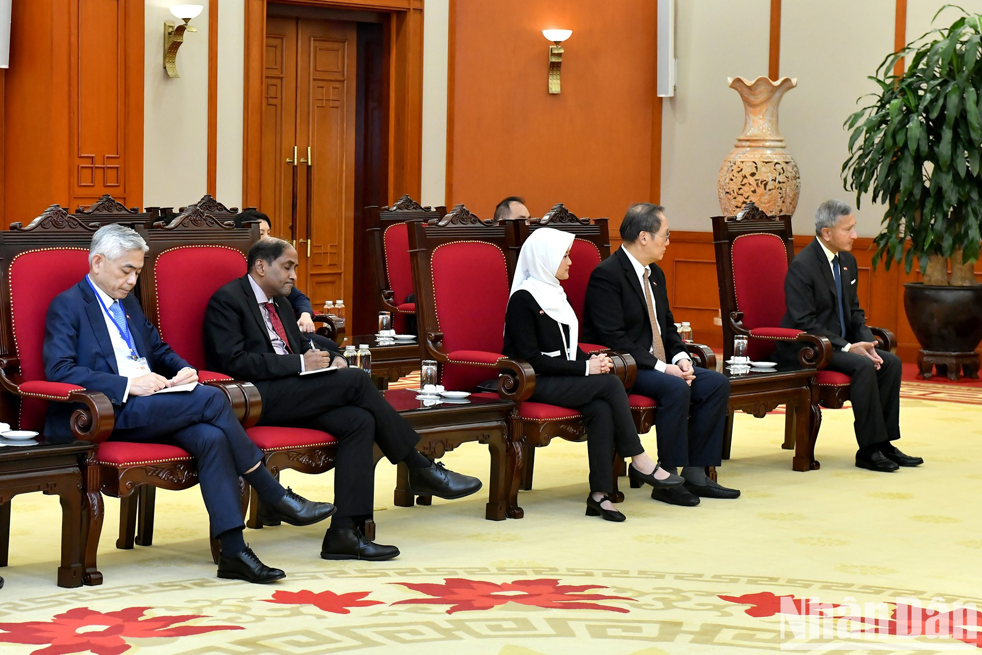 Delegados singapurenses asisten a la cita. Delegados singapurenses asisten a la cita.