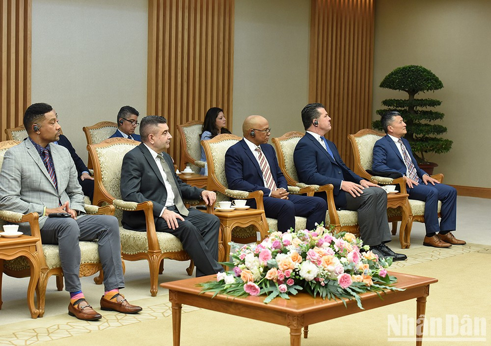 [Foto] Premier vietnamita recibe a una delegación del estado de California ảnh 7