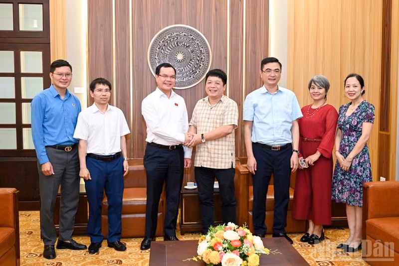 Los delegados a la reunión. (Fotografía: Nhan Dan)