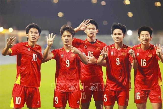 Jugadores vietnamitas celebran la victoria contra Corea del Sur. (Foto: VNA)