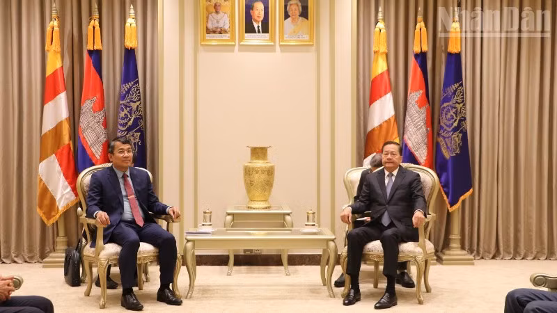 Escena de la reunión. (Foto: Nhan Dan)