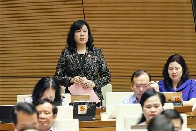 La ministra de Salud Pública, Dao Hong Lan, interviene en la cita. (Fotografía: VNA)
