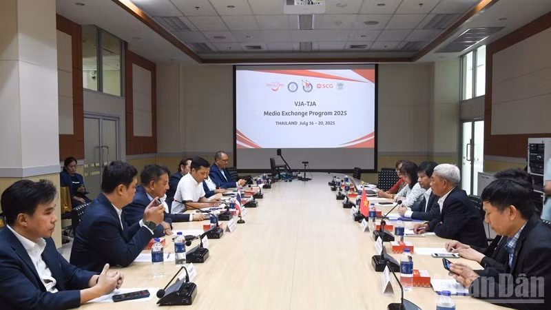 Escena de la reunión. (Foto: Nhan Dan)