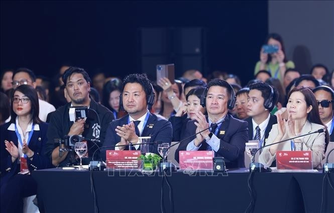 Delegados en la sesión de diálogo de alto nivel del Foro del Sector Privado de Vietnam. (Foto: VNA)