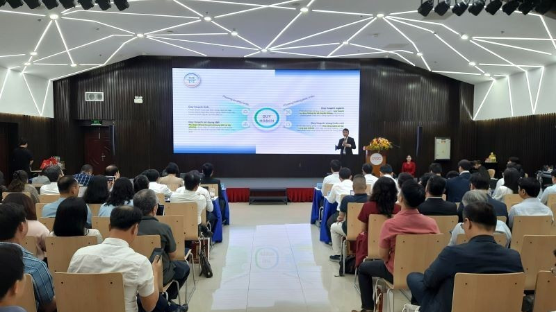 Escena del seminario. (Foto: Nhan Dan)