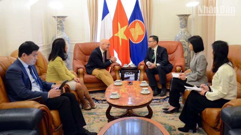 Escena de la reunión. (Foto: Nhan Dan)