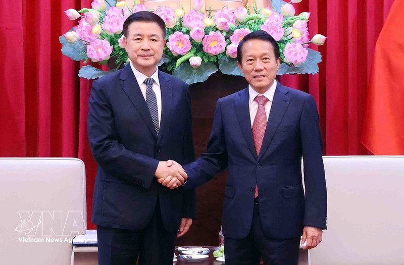 El ministro de Seguridad Pública de Vietnam, Luong Tam Quang (derecha), y su homólogo chino, Wang Xiaohong. (Foto: VNA)