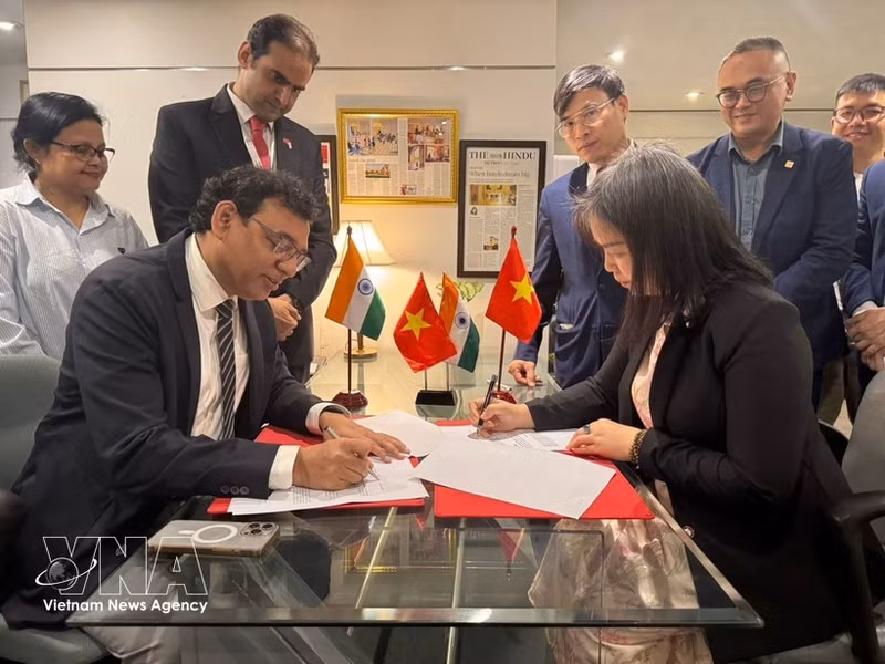 Escena de la firma. (Foto: VNA)