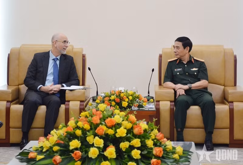 En la reunión. (Fotografía: qdnd.vn)