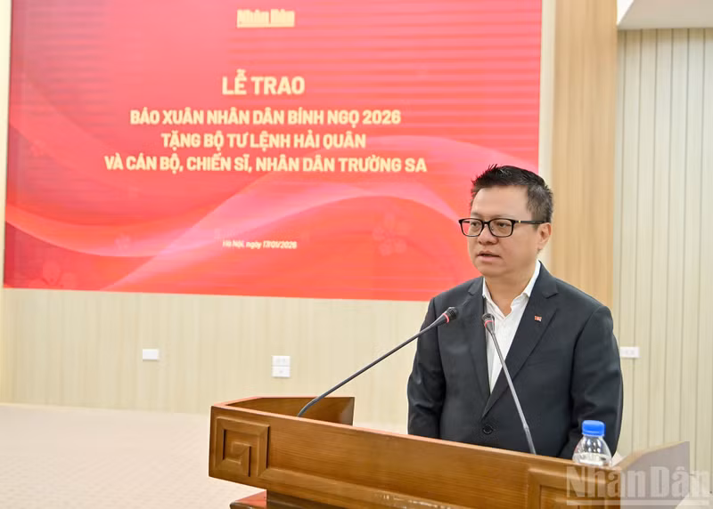 Le Quoc Minh, presidente editor del diario Nhan Dan habla en la cita (Foto: Nhan Dan)