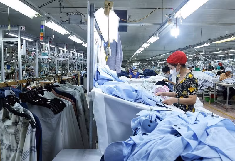 Producción de textiles para la exportación. (Foto: VNA)