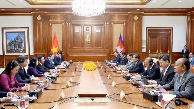 En la reunión. (Foto: VNA)