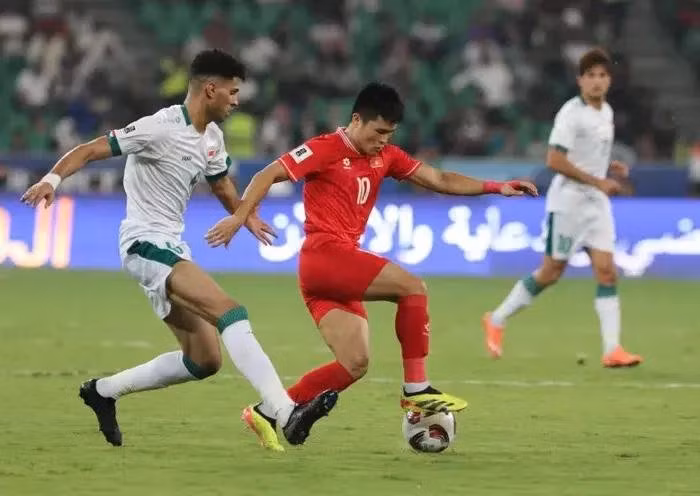 Una jugada en el partido entre Vietnam e Iraq. (Foto: VNA)
