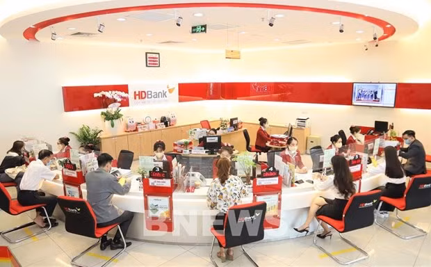 HDBank revela un plan para aportar capital y comprar acciones de una empresa del sector de valores para convertir esa empresa en una filial de HDBank. (Fotografía: VNA)