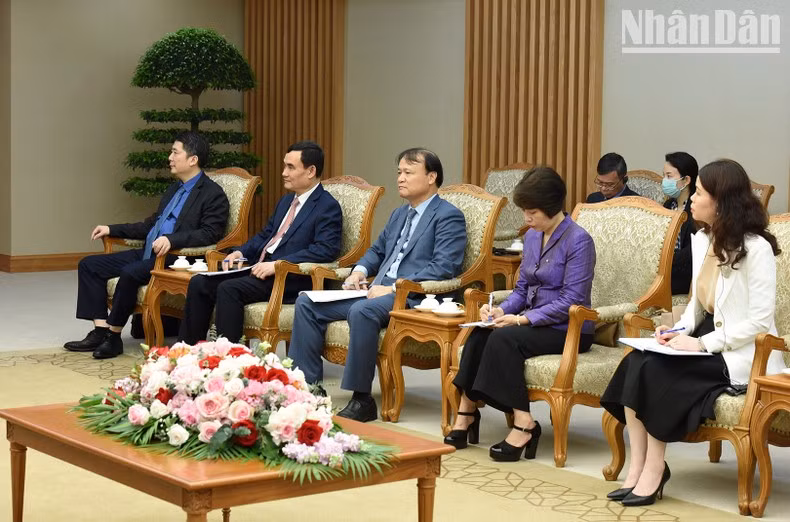 Representantes de los ministerios y sectores de Vietnam en el encuentro.