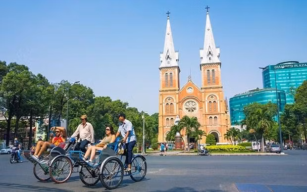 Turistas extranjeros en Ciudad Ho Chi Minh. (Fotografía: laodong.vn)