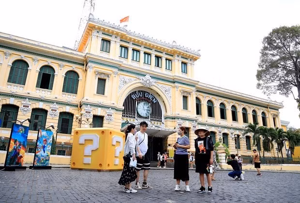 Turistas en Ciudad Ho Chi Minh. (Foto: VNA)