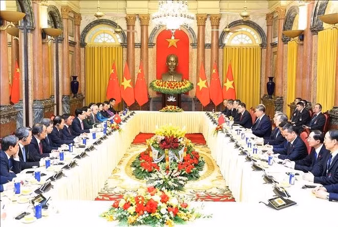 En la reunión. (Foto: VNA)