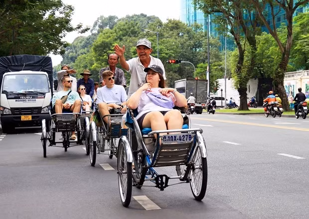 Turistas en Ciudad Ho Chi Minh. (Fotografía: VNA)