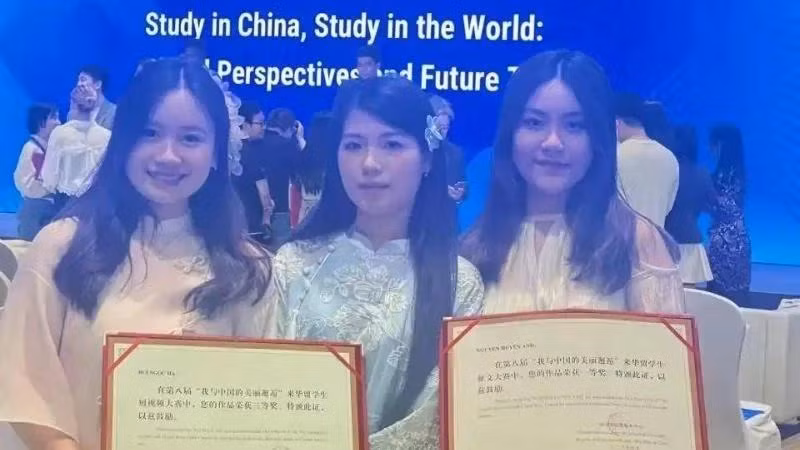 Estudiantes vietnamitas en China. (Foto: Nhan Dan)