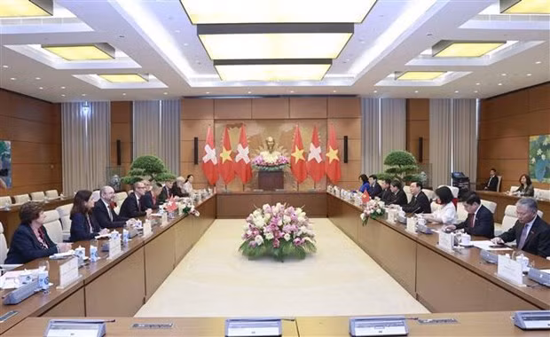 Escena de la reunión. (Foto: VNA)