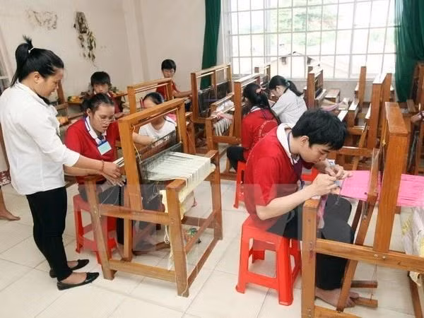 Una clase de capacitación vocacional para los discapacitados (Foto: VNA)