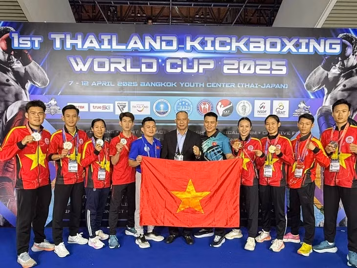 Atletas y entrenadores vietnamitas en el torneo (Foto: VNA)