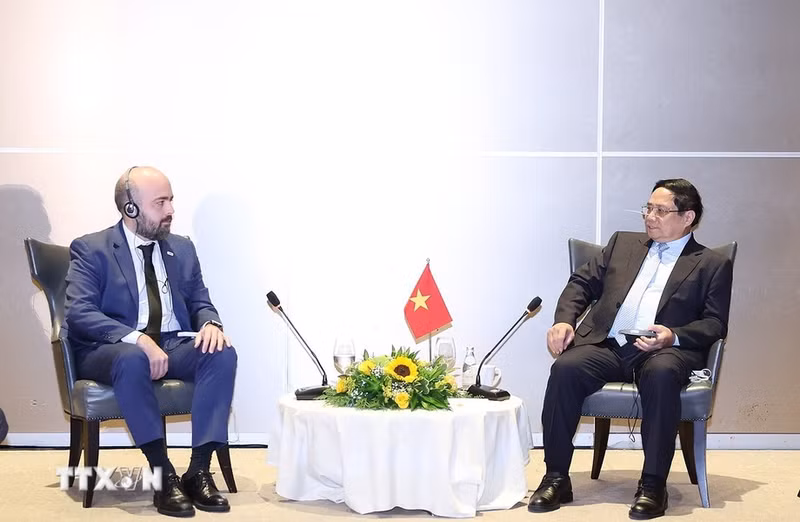 El primer ministro de Vietnam, Pham Minh Chinh, en la reunión con Márcio Rodrigues, director financiero del Grupo JBS.