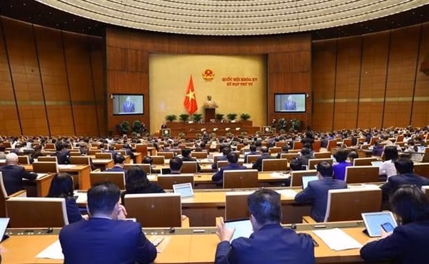 El trabajo del personal es el foco de atención de la Asamblea Nacional de la XV legislatura en la sesión matutina del 21 de octubre. (Fotografía: VNA)