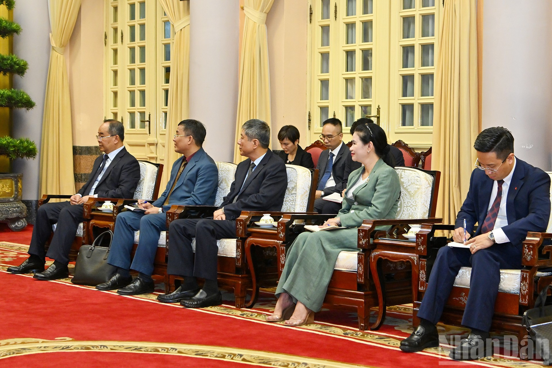 Delegados vietnamitas presentes en el acto.