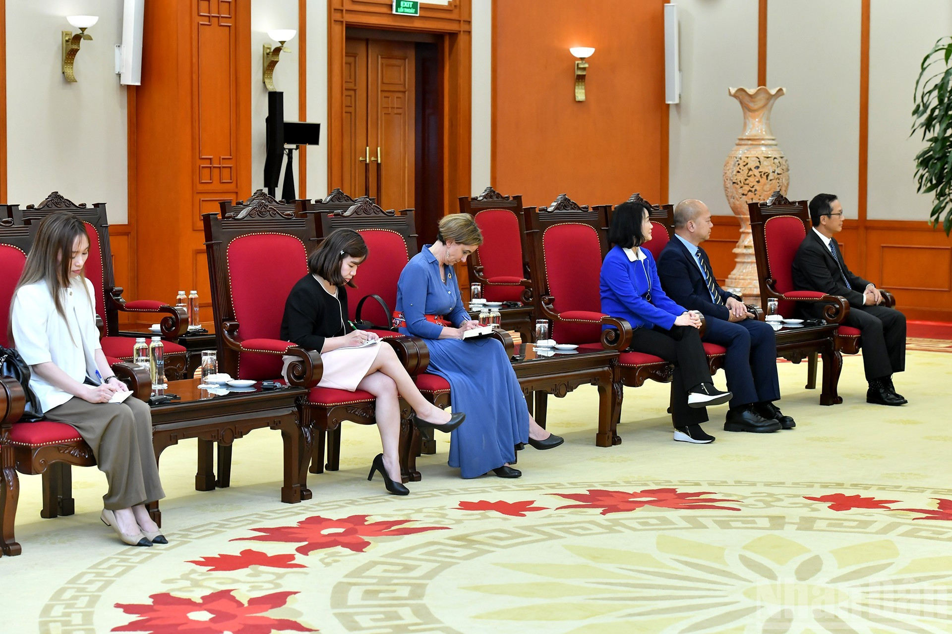 Delegados de la corporación Qualcomm a la recepción.