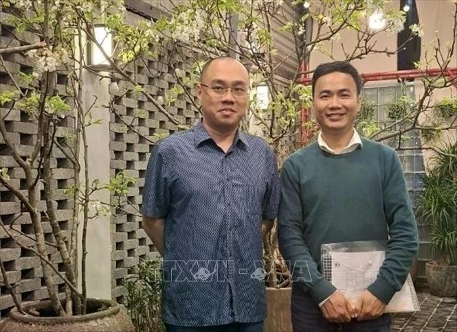 El profesor asociado y doctor Pham Quoc Nghi (derecha). (Foto: VNA)