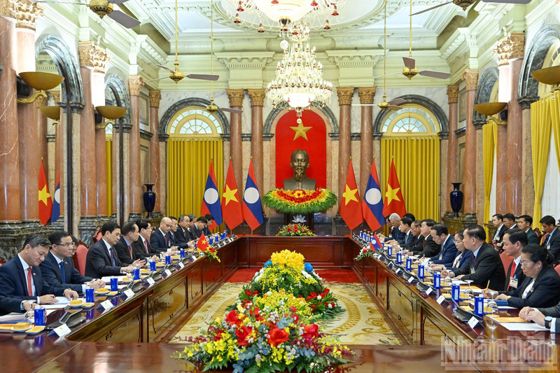 Escena de la reunión. (Foto: Nhan Dan)