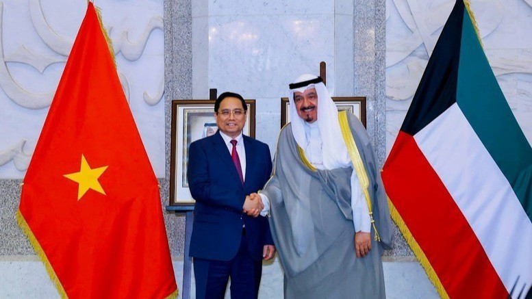 El primer ministro de Vietnam, Pham Minh Chinh, y su homólogo kuwaití, Sheikh Ahmad Al-Abdullah Al-Sabah. (Foto: VGP)