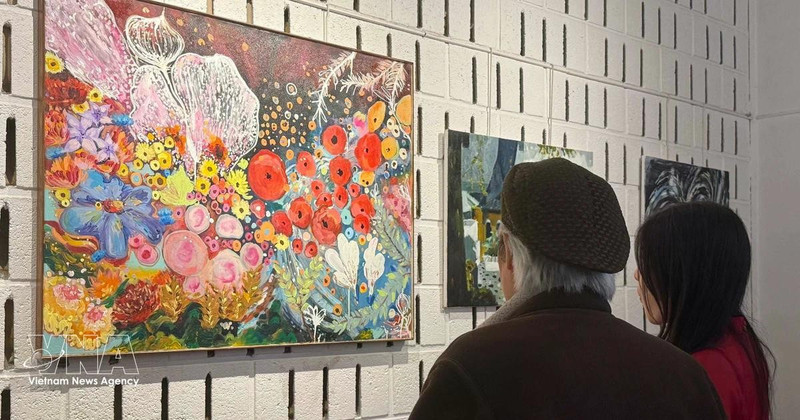 Visitantes en la exposición (Foto: VNA)