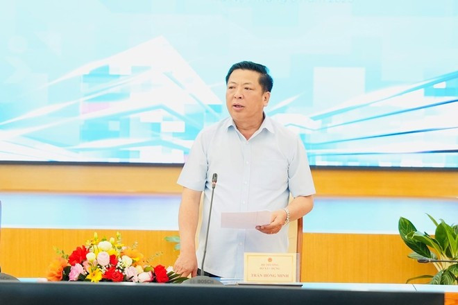 Tran Hong Minh, ministro de Construcción, habla en el evento. (Foto: VNA)