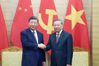 El secretario general del Partido Comunista de Vietnam, To Lam, y el secretario general del Partido Comunista y presidente de China, Xi Jinping. (Foto: VNA)